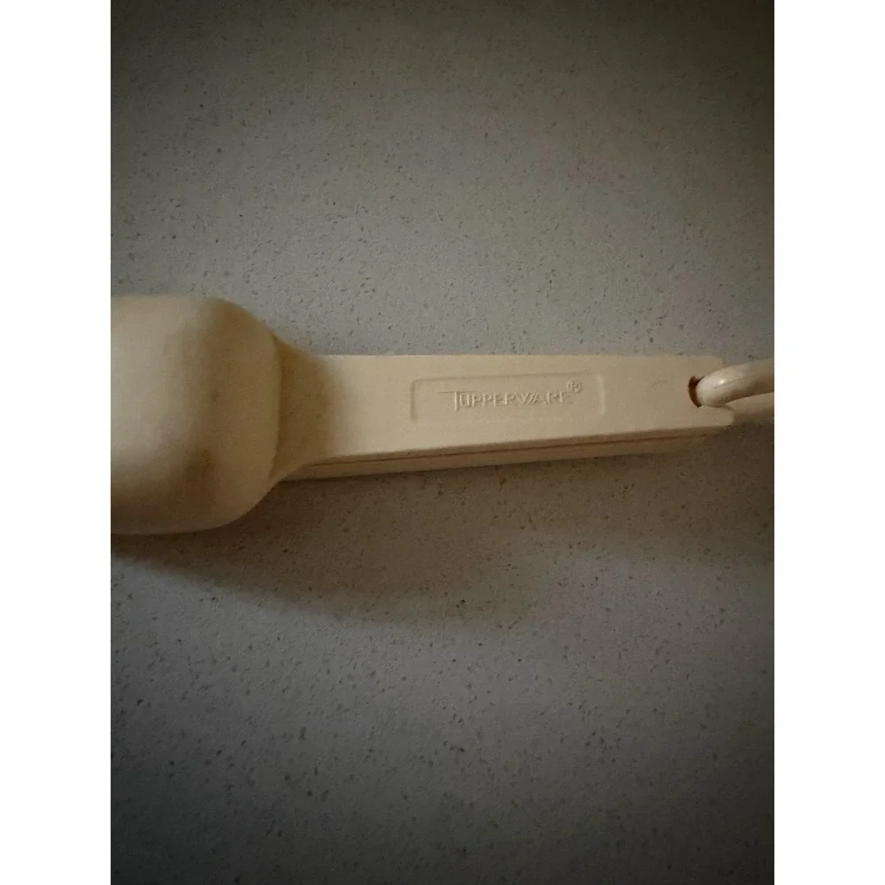 TUPPERWARE Vintage Almond nesting measuring spoons complete set of 7 ~ Preowned